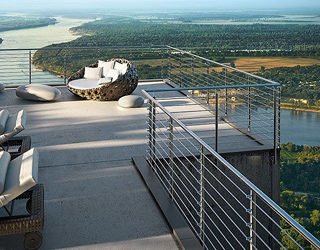 Why do the construction industry frequently use stainless steel stair guardrails?
